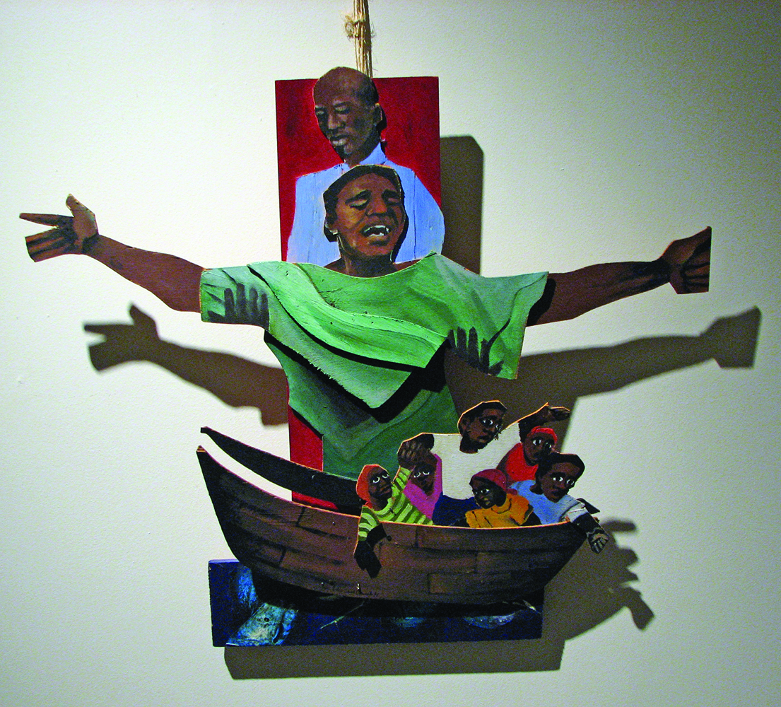 Sr. Helen David Brancato, IHM, Crucifixion – Haiti, 1997. Acrylic and collage on wood. MOCRA collection. Photo by Jeffrey Vaughn.